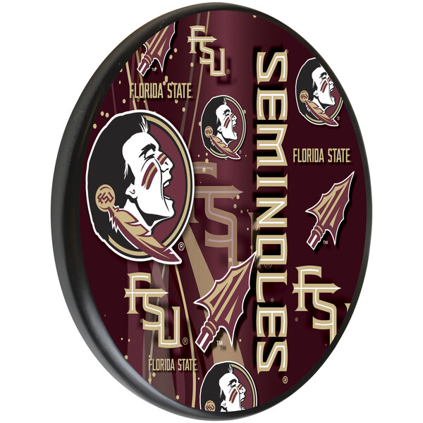 A round red and gold wooden sign with a Florida State University logo.