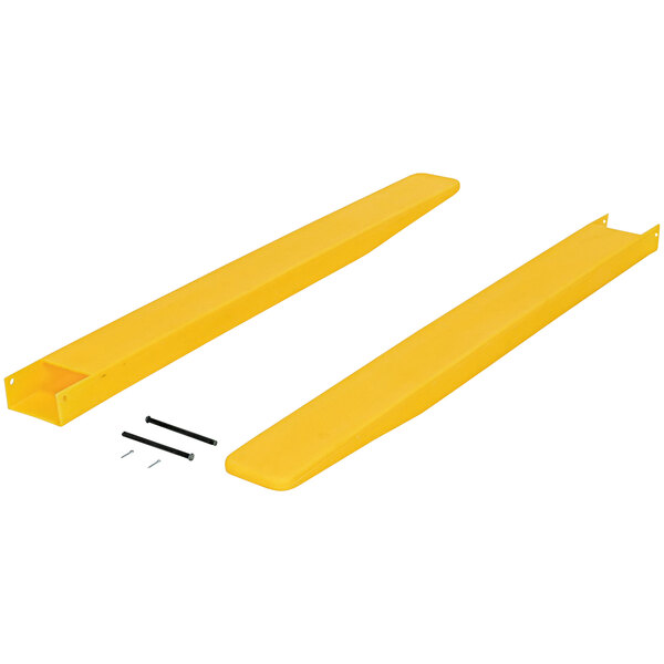 A close up of yellow polyethylene fork blade protectors for Vestil fork blades.