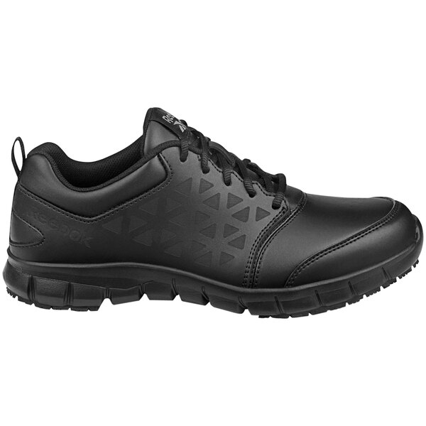 A pair of black Reebok Work Sublite athletic shoes for women.