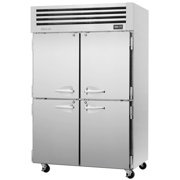 A Turbo Air Premiere Pro Series reach-in freezer with two solid half doors.
