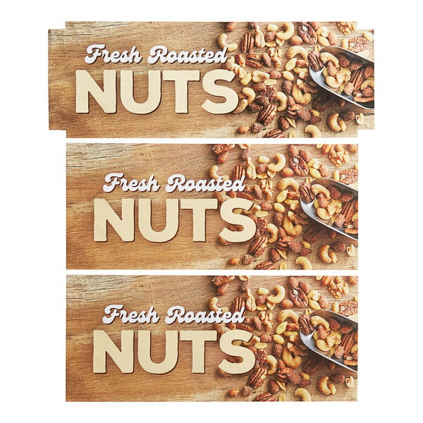 A wooden board with three signs of different nuts.