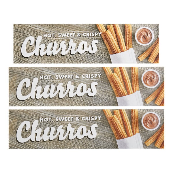 A white decal with the word "churros" over a wood surface with churros and chocolate.