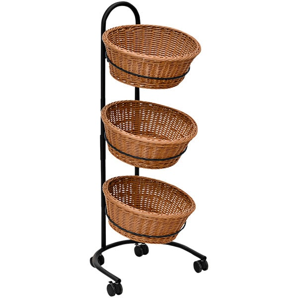 A black mobile stand with three round wicker baskets.