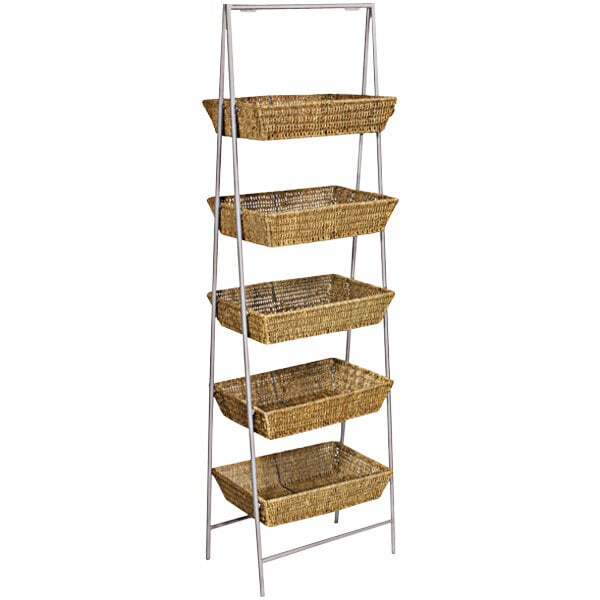 A 5-tier rectangular wicker basket stand with multiple baskets on it.