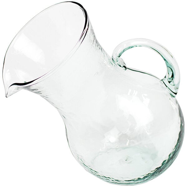 A Kalalou small tilted glass pitcher with a handle.