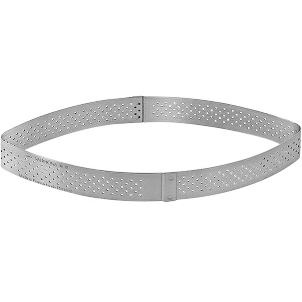 A stainless steel oval tart ring with perforations.