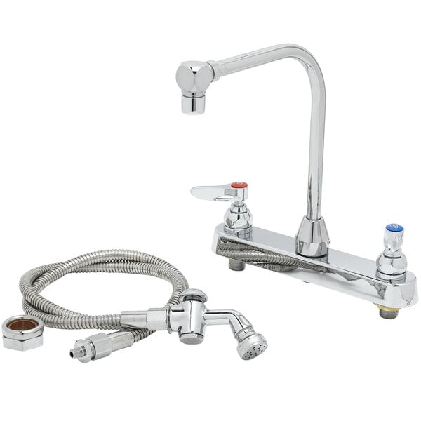 A T&S chrome deck-mount faucet with hose and 48" sprayer.