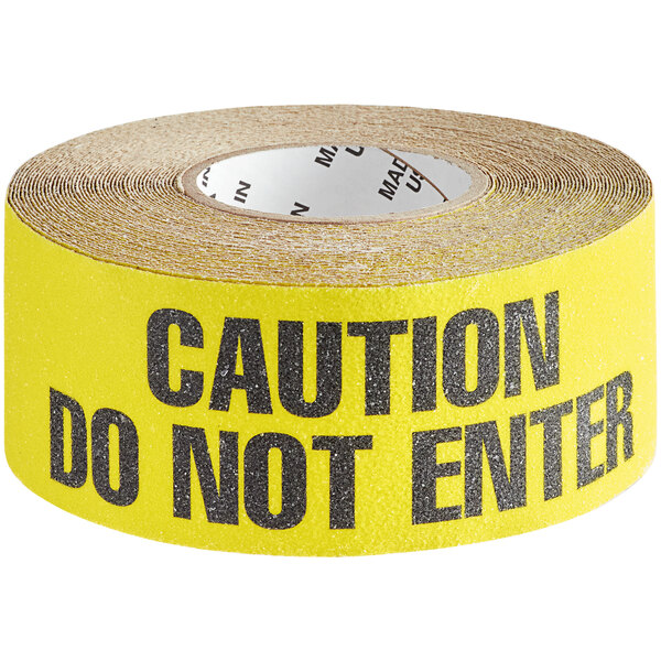 A roll of black and yellow "Caution Do Not Enter" anti-slip tape.