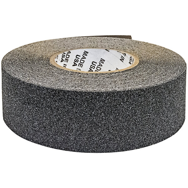A roll of Wooster black anti-slip tape with a label.