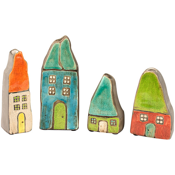 A group of ceramic houses in different colors.