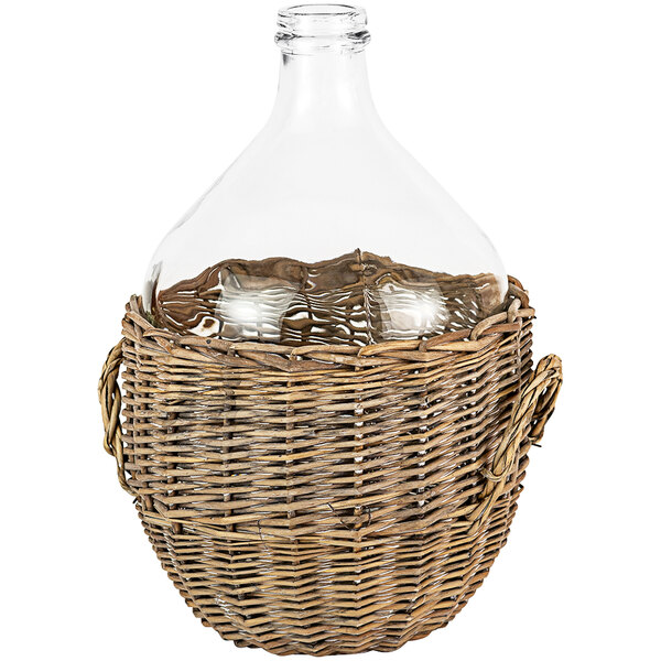 A large glass bottle in a wicker basket.