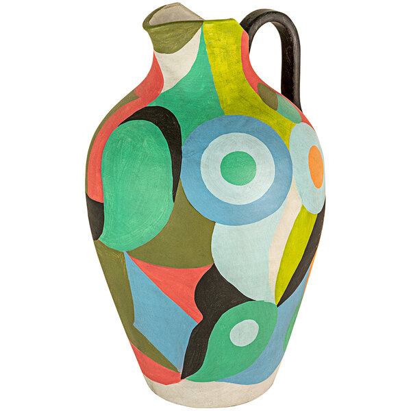 A multi-colored ceramic jug with a geometric design and a handle.