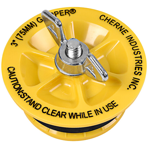 A yellow Cherne End of Pipe Gripper Plug with black and white label.