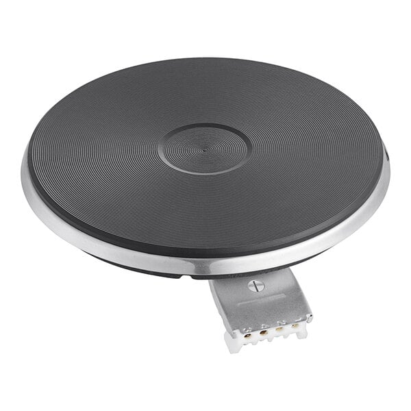 A black circular burner plate with a metal connector.