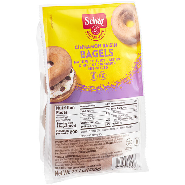 A Schar package of 4 pre-sliced bagels with raisins and a yellow and purple label.