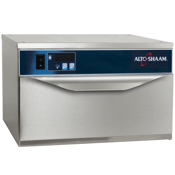 An Alto-Shaam narrow one drawer warmer on a counter with a blue and black panel.