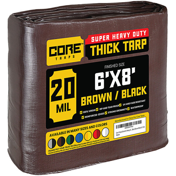 A brown Core heavy-duty weatherproof tarp with reinforced edges in plastic packaging.