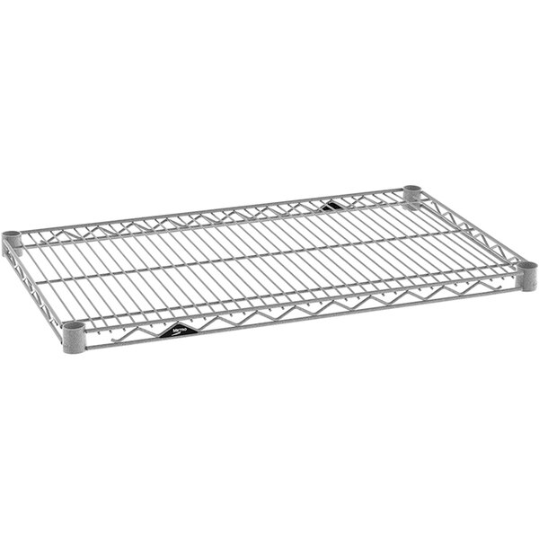 A Metro Super Erecta Metroseal wire shelf with a wire grid on it.