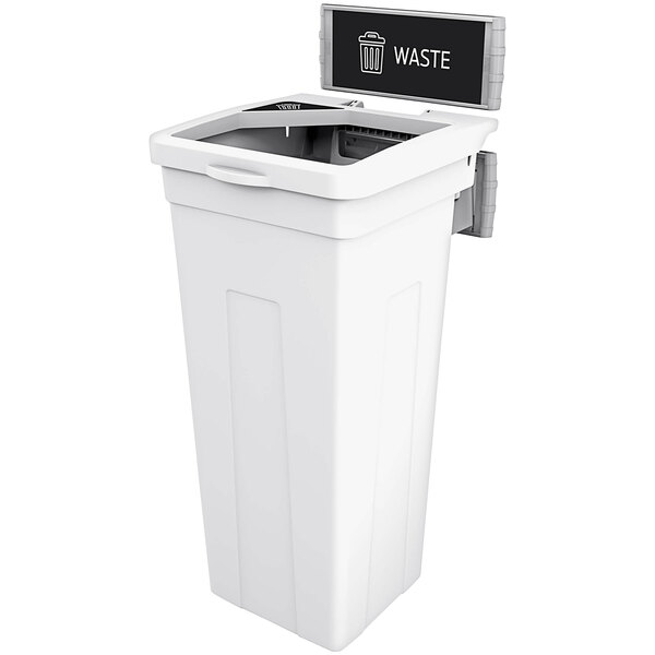 A white Busch Systems decorative waste receptacle with a black lid and a sign.
