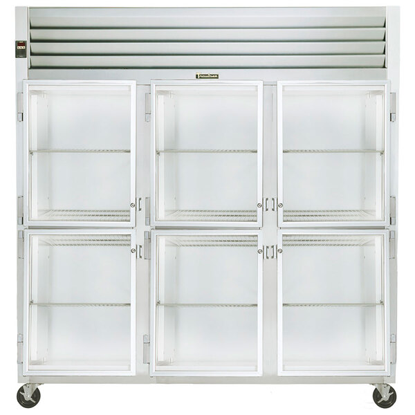 A white Traulsen reach-in refrigerator with three glass doors.
