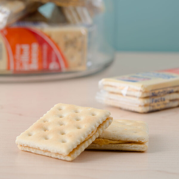 A close up of Lance Captain's Wafers Grilled Cheese Sandwich Crackers with cheese filling.