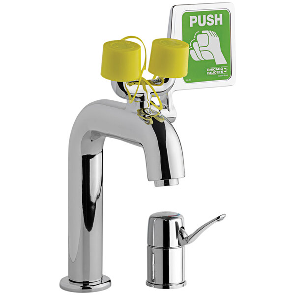 A Chicago Faucets single-handle safety eyewash faucet with a yellow push button.