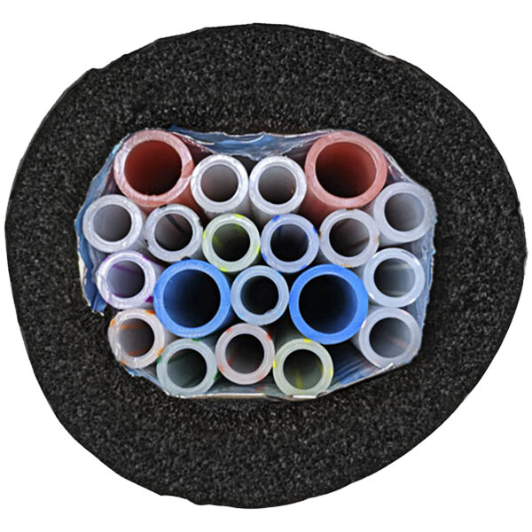 A black circle with several plastic and glycol tubes inside.