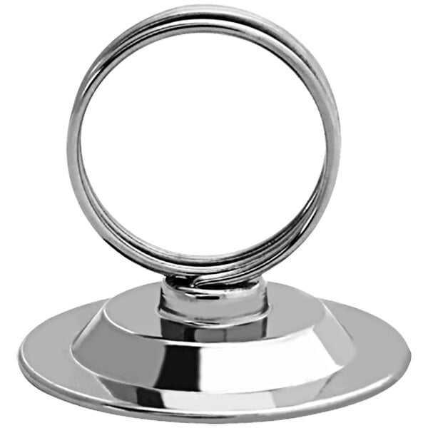 A chrome metal ring on a weighted stand with a silver ring on top.