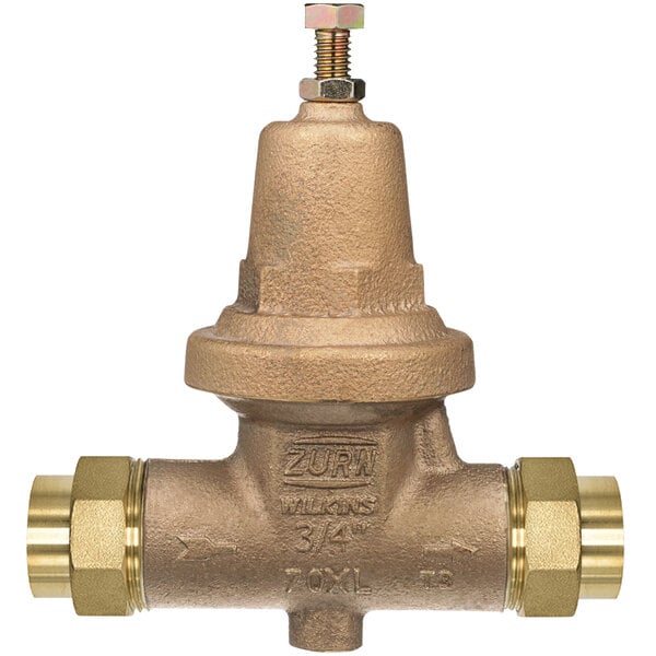 A Zurn brass water pressure reducing valve with double union connections.