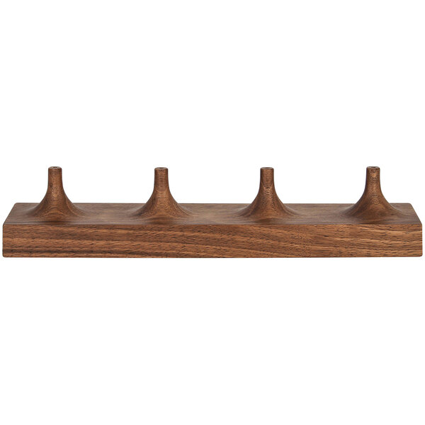 A wooden rectangular stand with 4 holes.