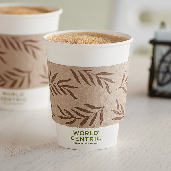 A World Centric coffee cup with a brown sleeve on it.