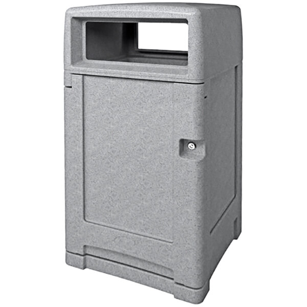 A grey rectangular Busch Systems outdoor waste receptacle with a lid on top.