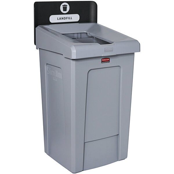 A grey recycling bin with a black lid.