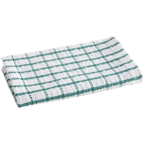 A white dish towel with a green windowpane design and a white border.
