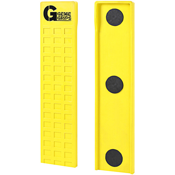Two yellow rectangular GenieGrips with black circles on them.