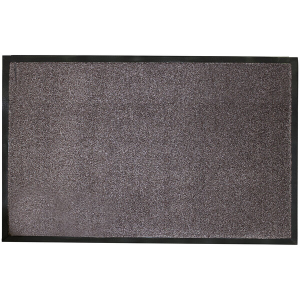 A brown rectangular rug with black border.