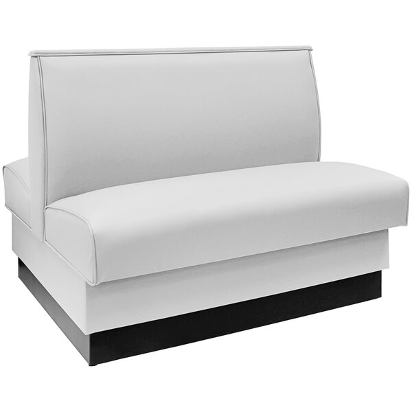 An American Tables & Seating white booth with black base.