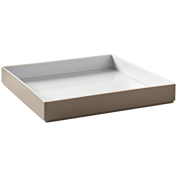 A white rectangular American Metalcraft melamine bowl/tray with a lid on it.