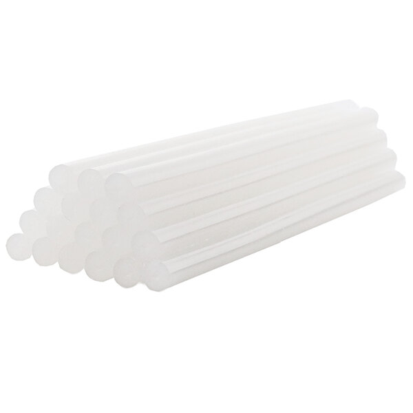 A close-up of a stack of white plastic tubes.