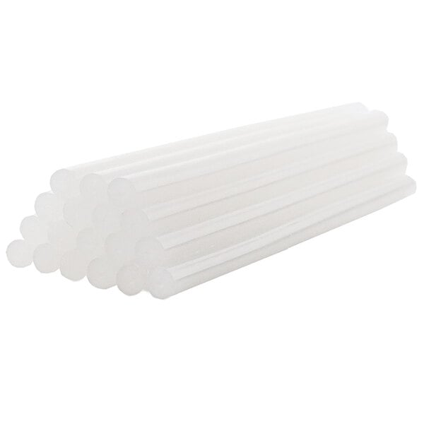 A stack of white plastic tubes on a white background.