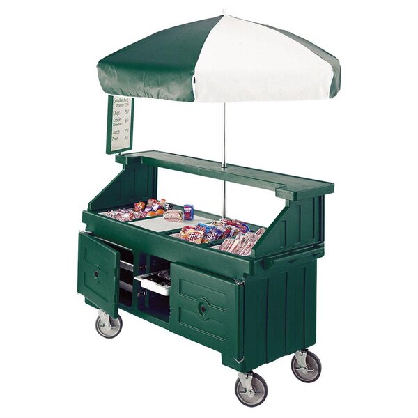 A green Cambro vending cart with a white canopy and umbrella.