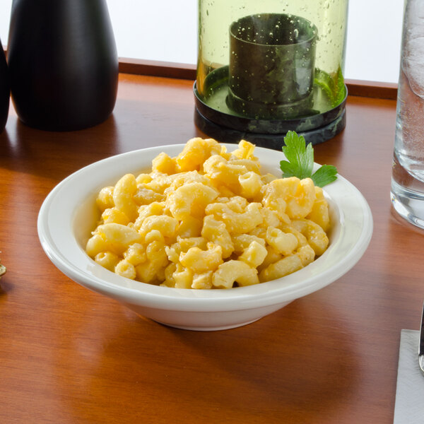 A bowl of macaroni and cheese served in a Tuxton narrow rim china bowl.