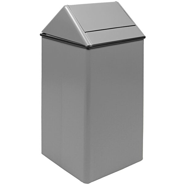 A grey rectangular Witt Industries steel waste receptacle with a black swing top lid.