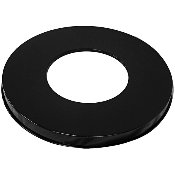 A black steel flat top lid with a black circle and a white circle on the top.