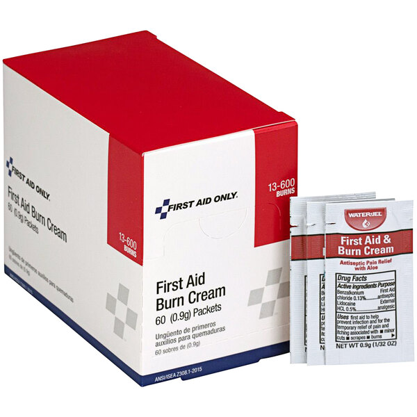 A white and red First Aid Only box containing burn cream packets.