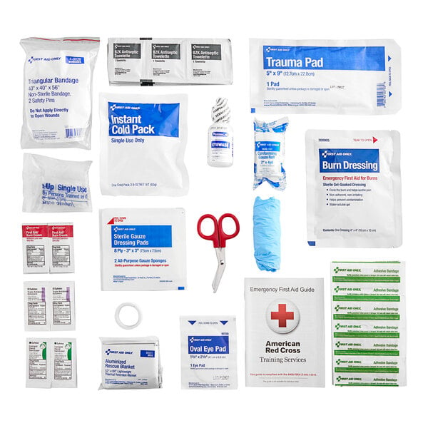 A group of First Aid Only first aid supplies including scissors.