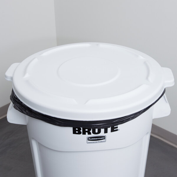 A white Rubbermaid BRUTE trash can lid.