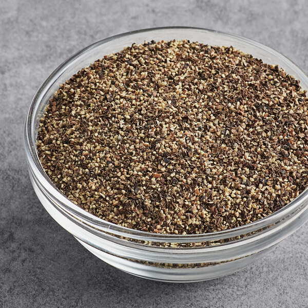 A bowl of McCormick Culinary Table Grind Black Pepper.