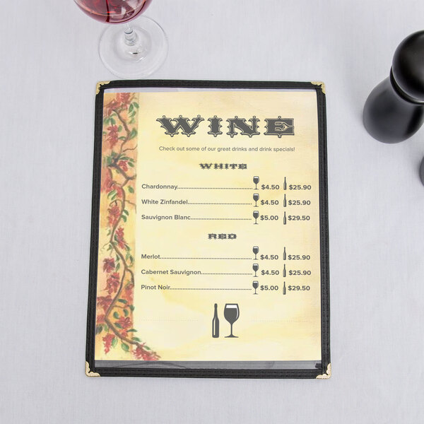 An 8 1/2" x 11" menu with a Mediterranean villa design and a glass of wine on it.