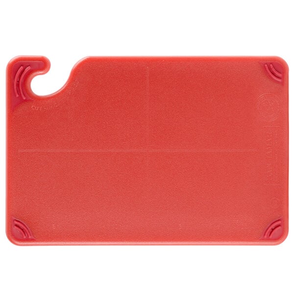A red plastic San Jamar cutting board with a hook.